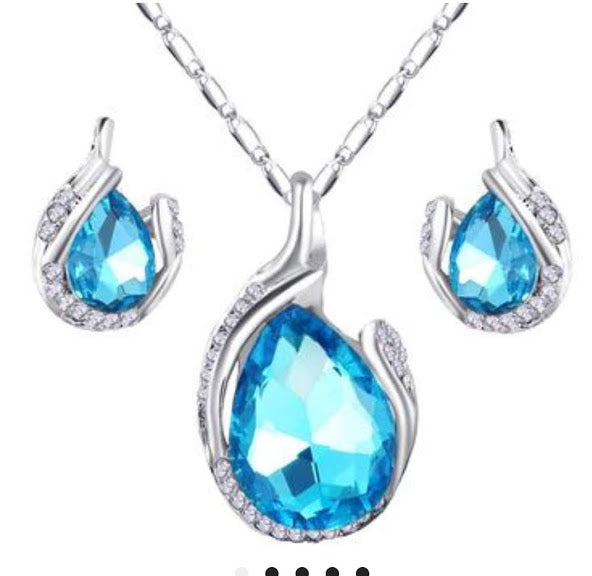 Teardrop Colored Stone Wrapped in White Bling